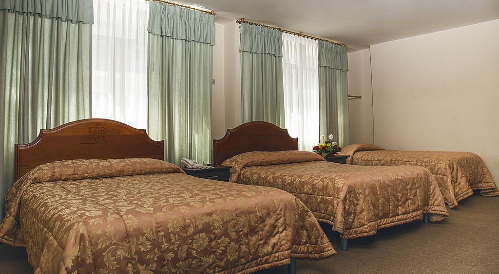 Hotel Podocarpus Лоха Номер фото